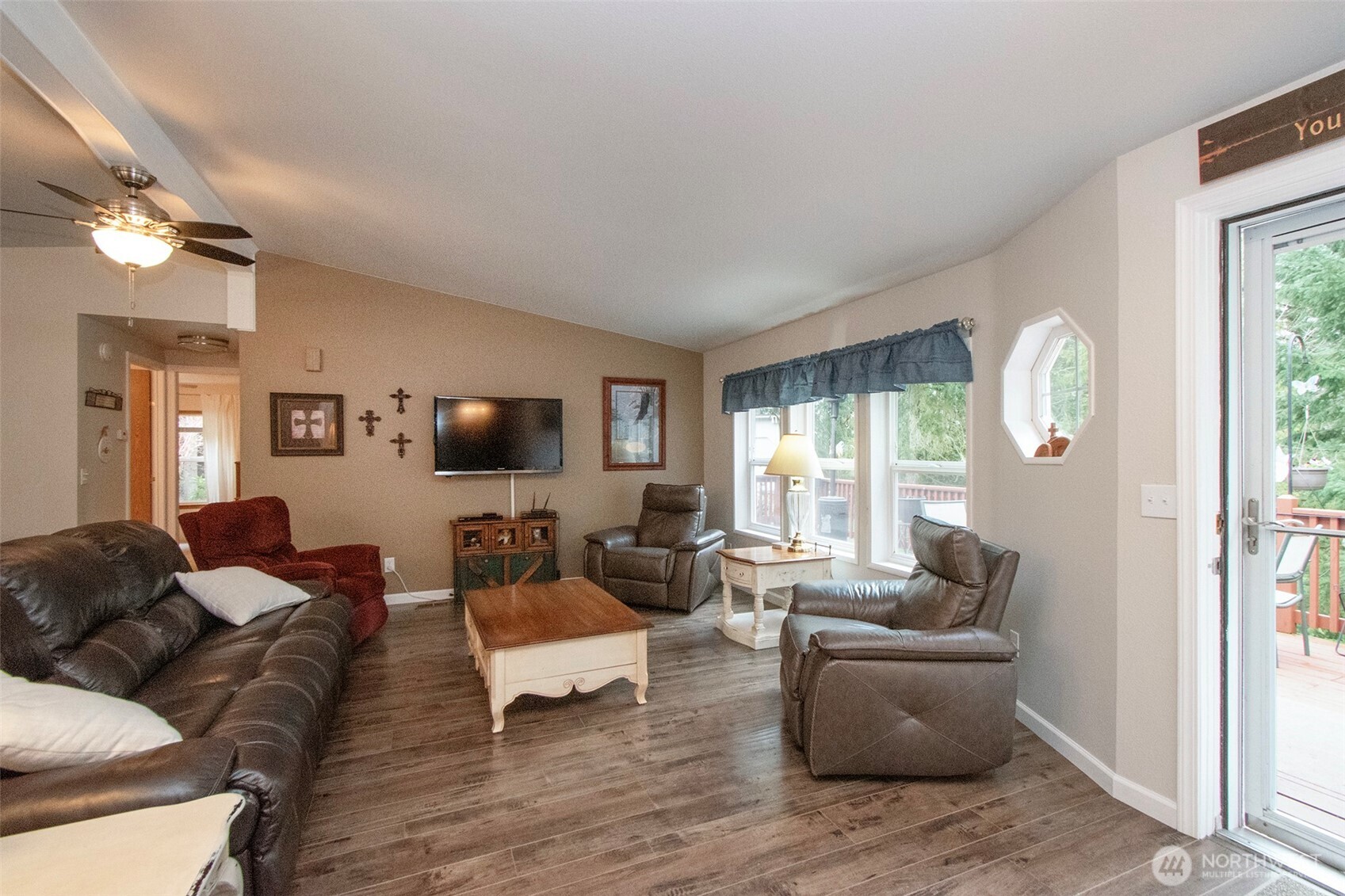 141 Lavender Ridge Lane Sequim, WA 98382 - Photo 7 of 40 a living room with furniture and a flat screen tv