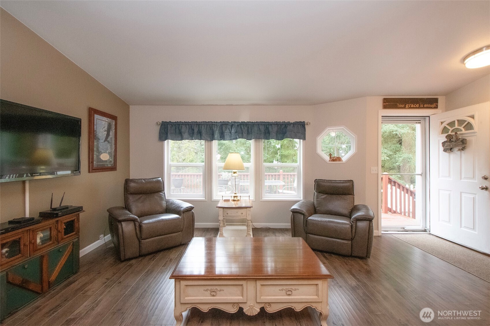 141 Lavender Ridge Lane Sequim, WA 98382 - Photo 9 of 40 a living room with furniture and a flat screen tv