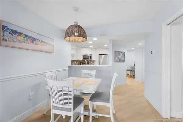 a view of a dining room with furniture