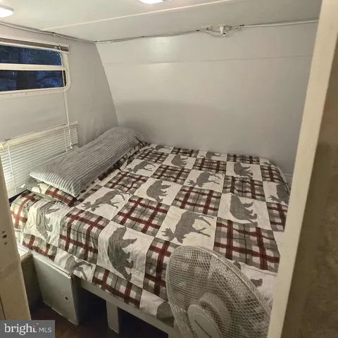 a bedroom with a bed