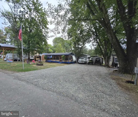a view of street with parked cars