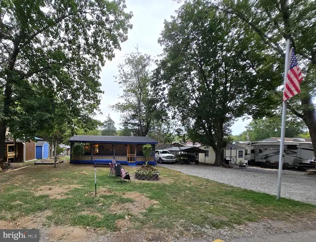 a view of street with parked cars