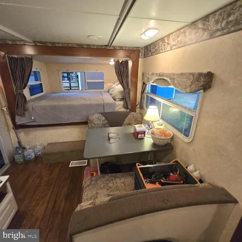 a living room with a couch and a table