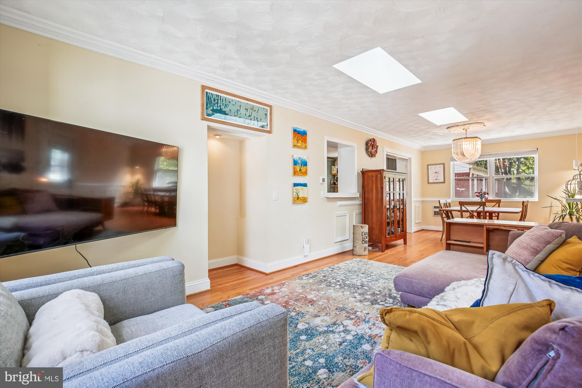 4805 Topping Road Rockville, MD 20852 - Photo 14 of 38 a living room with furniture and a flat screen tv