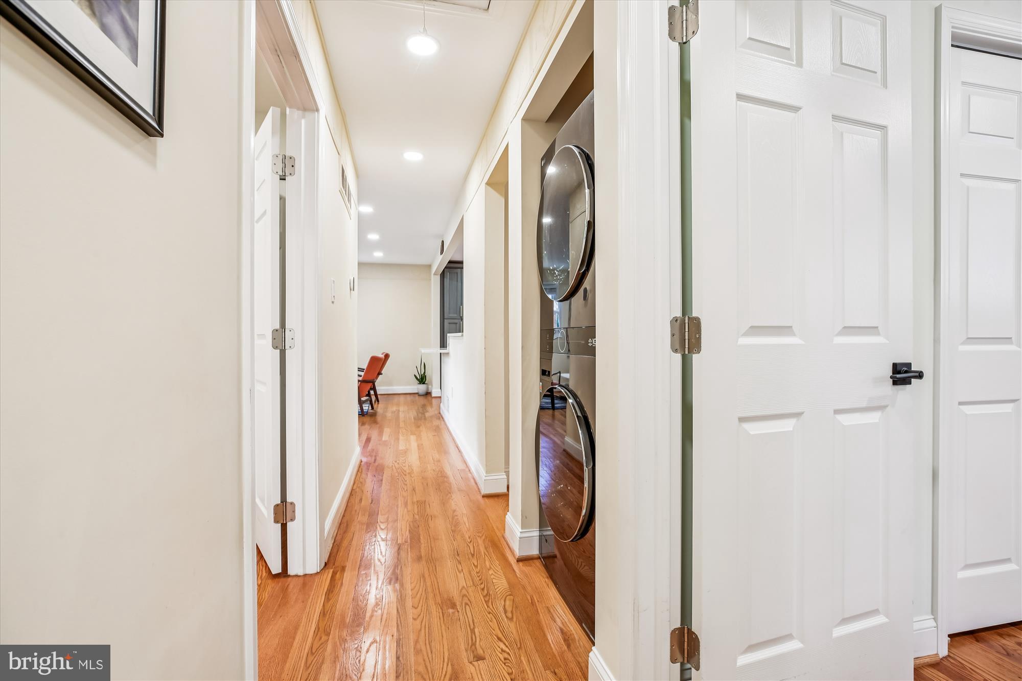 4805 Topping Road Rockville, MD 20852 - Photo 15 of 38 a view of a hallway with wooden floor and staircase