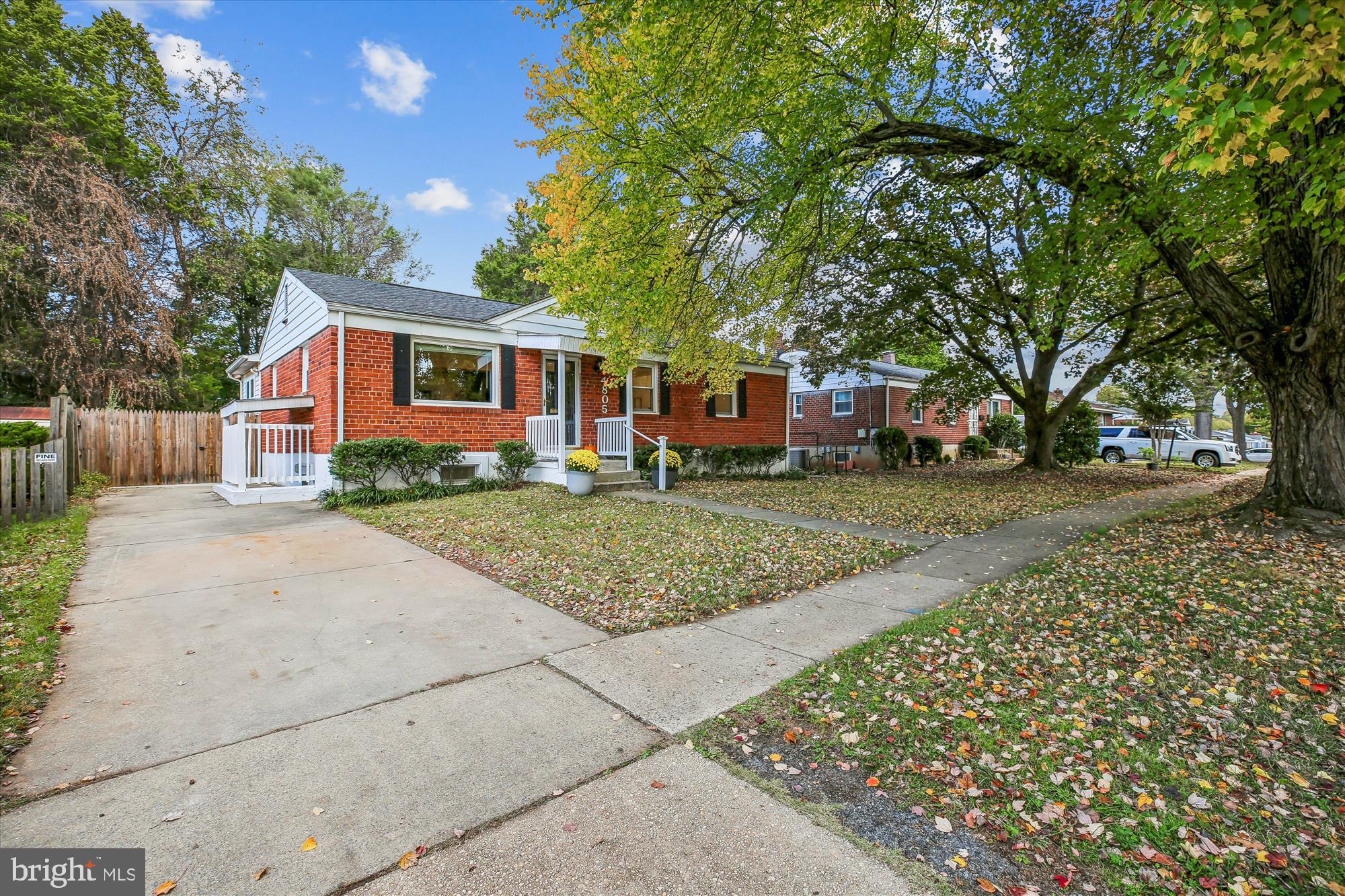 4805 Topping Road Rockville, MD 20852 - Photo 2 of 38 a front view of a house with a yard