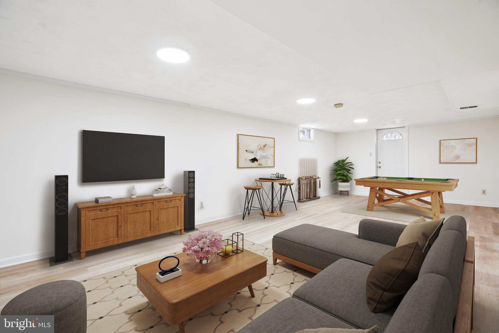 4805 Topping Road Rockville, MD 20852 - Photo 23 of 38 a living room with furniture and a flat screen tv