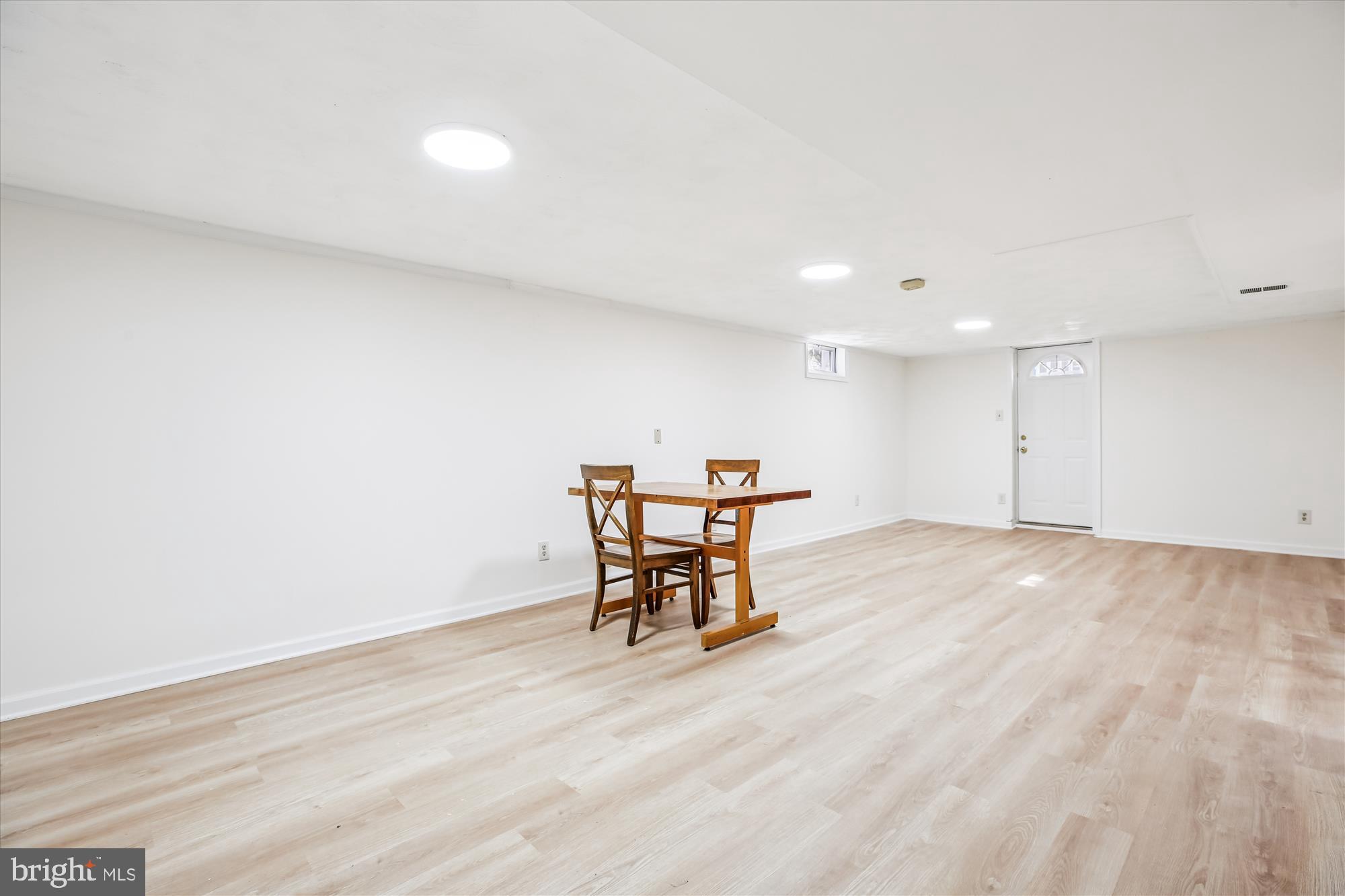 4805 Topping Road Rockville, MD 20852 - Photo 24 of 38 a view of a room with a table and chairs