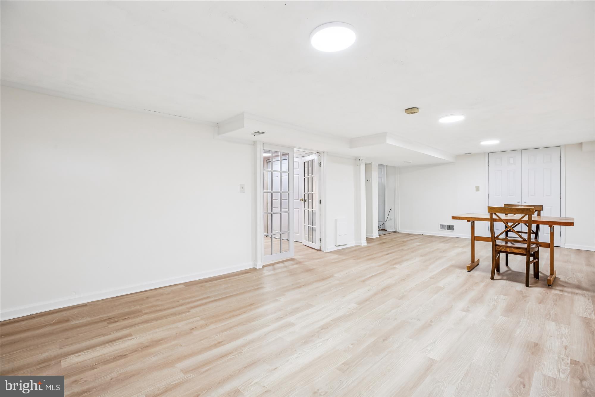 4805 Topping Road Rockville, MD 20852 - Photo 26 of 38 a view of an empty room with wooden floor and a window