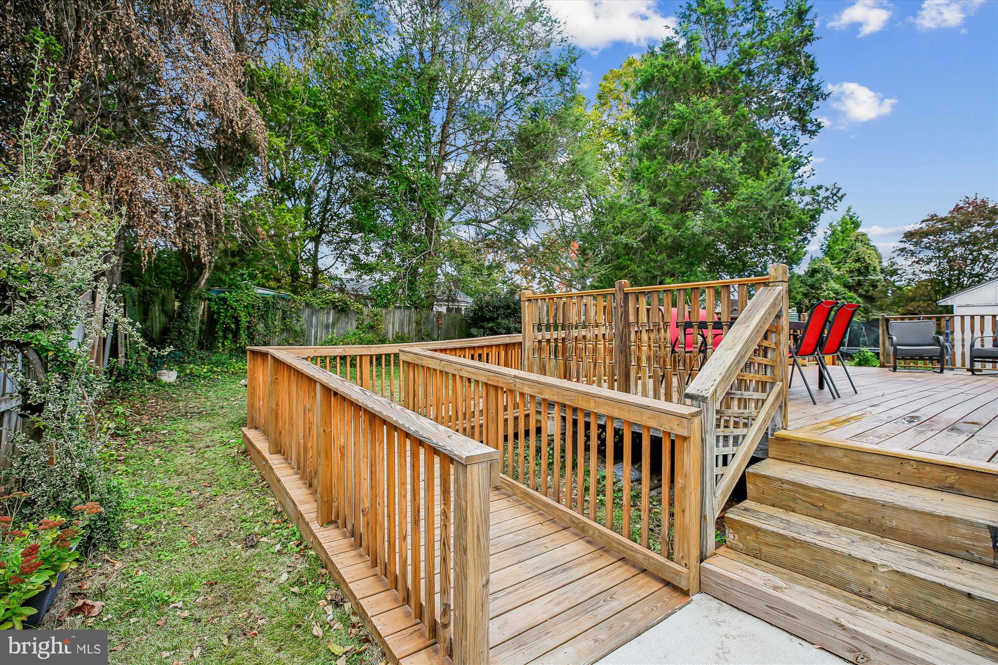 4805 Topping Road Rockville, MD 20852 - Photo 34 of 38 a view of staircase with railing and trees