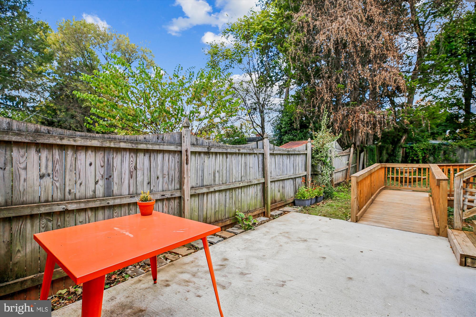 4805 Topping Road Rockville, MD 20852 - Photo 35 of 38 a backyard of a house with table and chairs