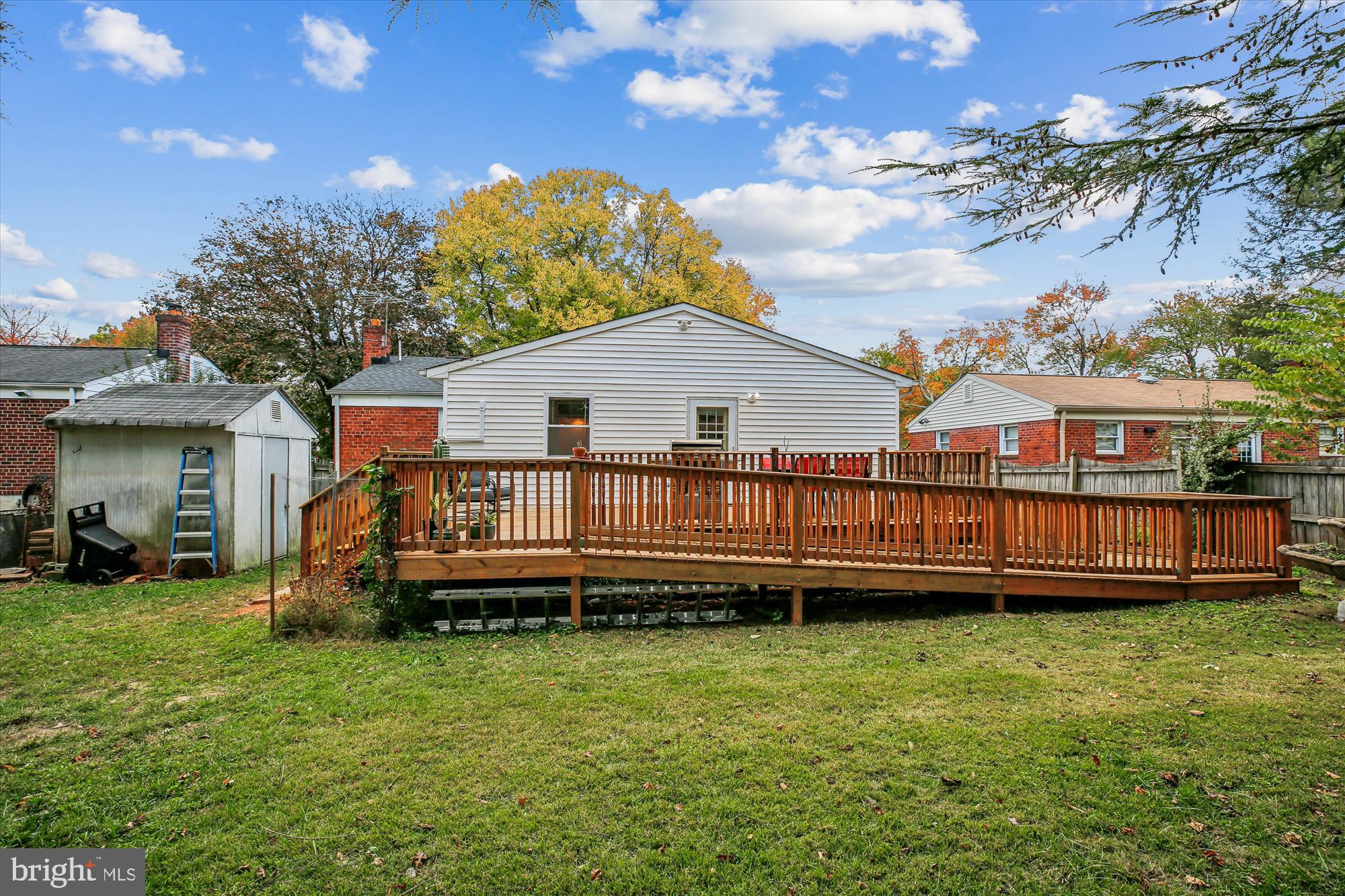4805 Topping Road Rockville, MD 20852 - Photo 36 of 38 a view of a house with a backyard and a patio