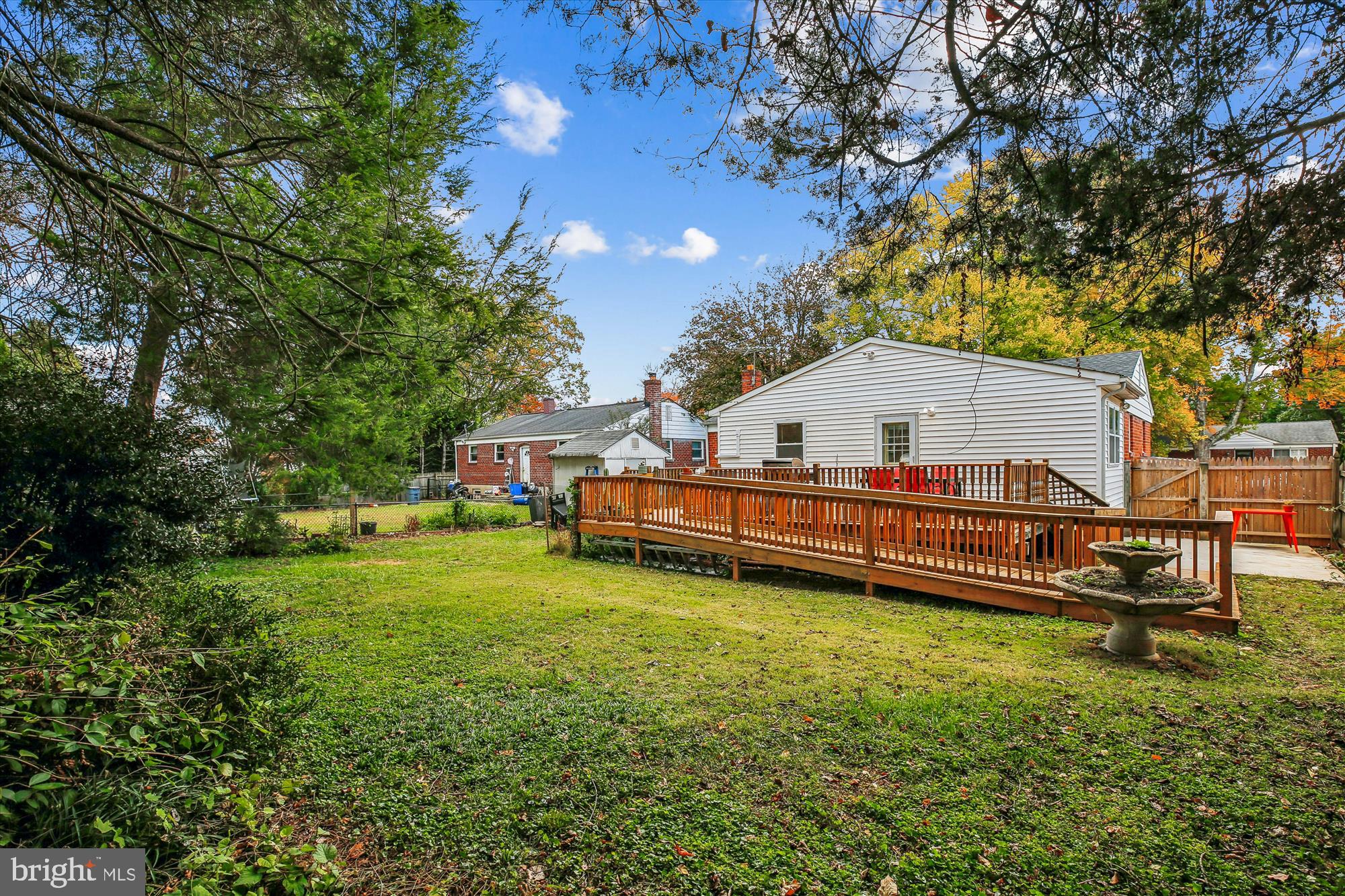 4805 Topping Road Rockville, MD 20852 - Photo 37 of 38 a view of a house with a yard and sitting area