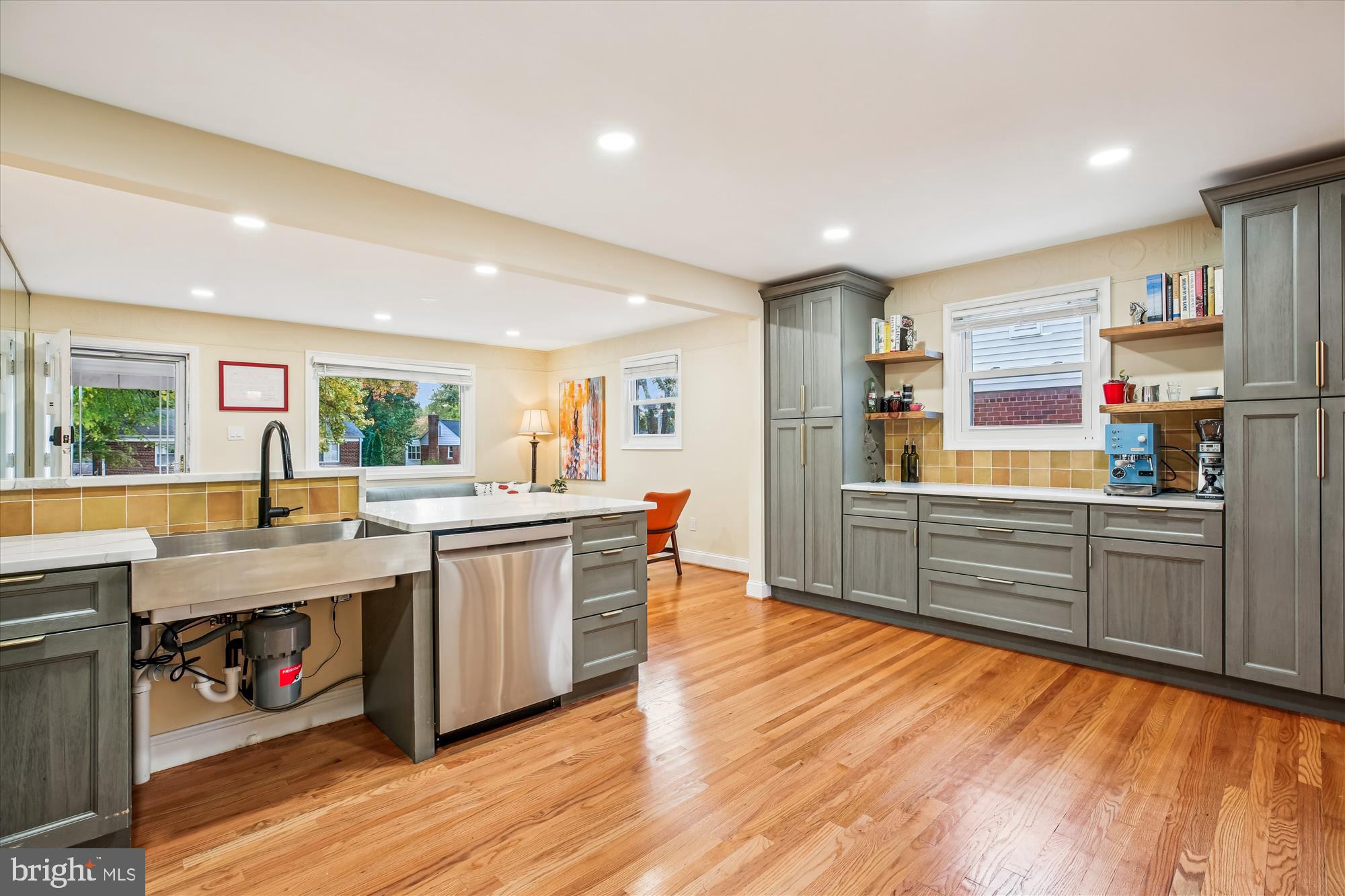 4805 Topping Road Rockville, MD 20852 - Photo 9 of 38 a kitchen with stainless steel appliances granite countertop a lot of counter space and wooden floors