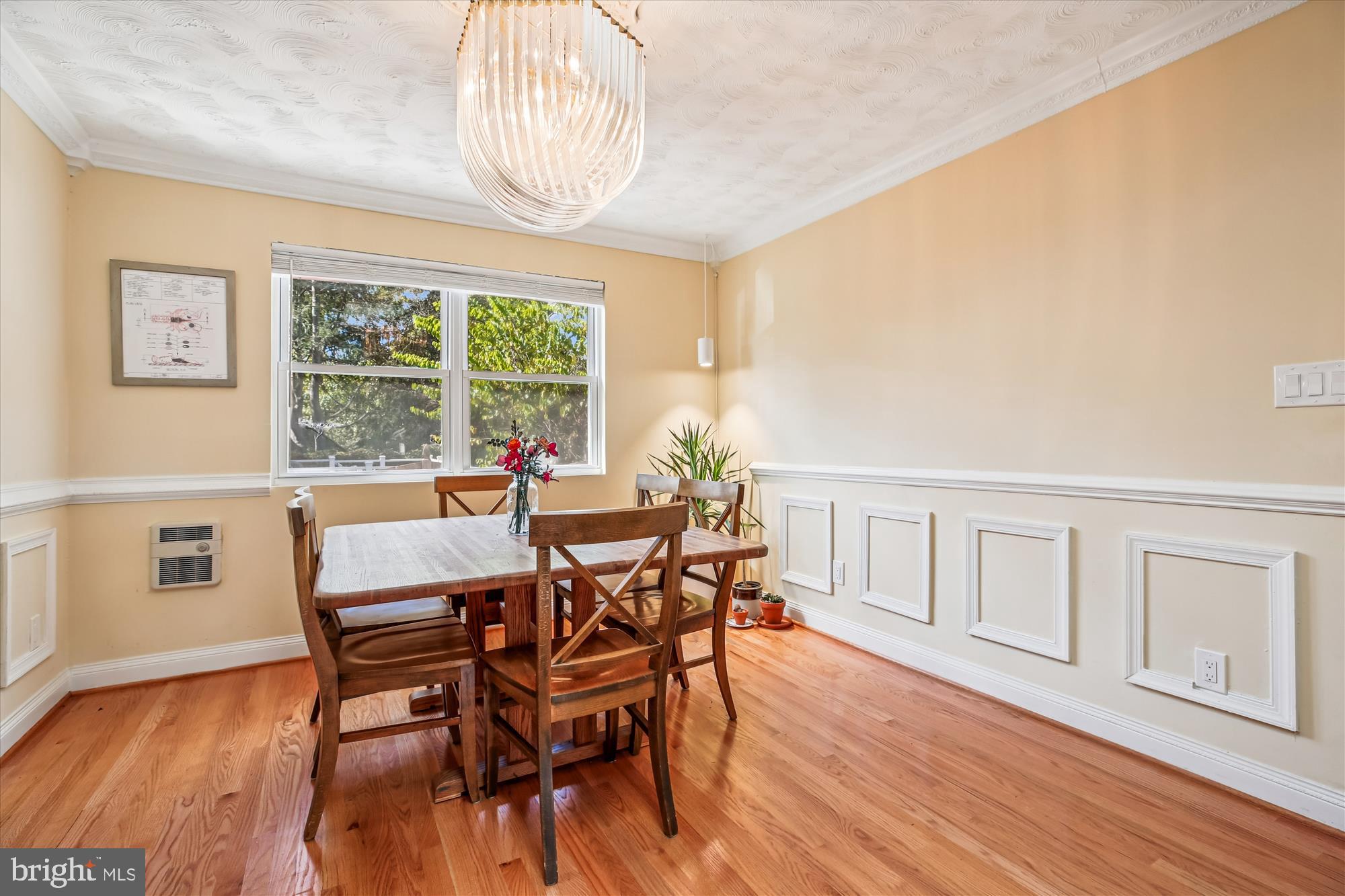 4805 Topping Road Rockville, MD 20852 - Photo 10 of 38 a dining room with furniture window wooden floor