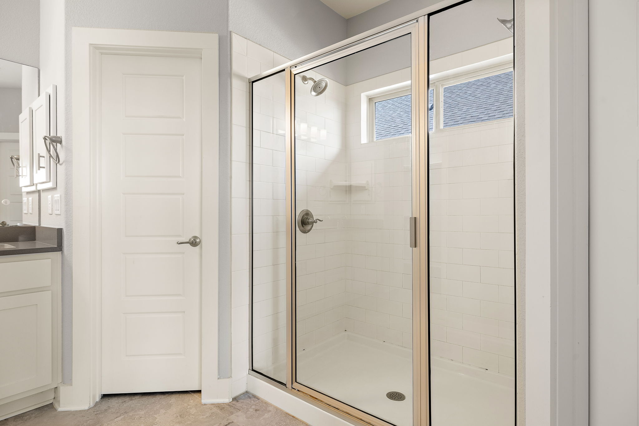 7520 Kinross Trail Austin, TX 78754 - Photo 17 of 37 Bathroom featuring a stall shower and vanity