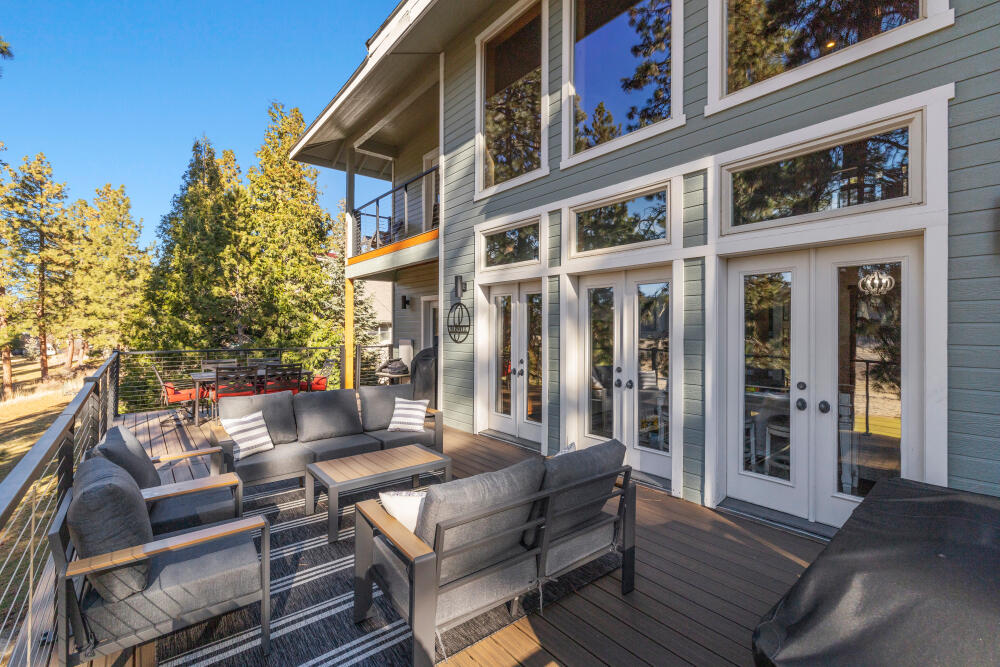 11750 Merganser Road Klamath Falls, OR 97601 - Photo 45 of 66 a view of a patio with a table and chairs and potted plants