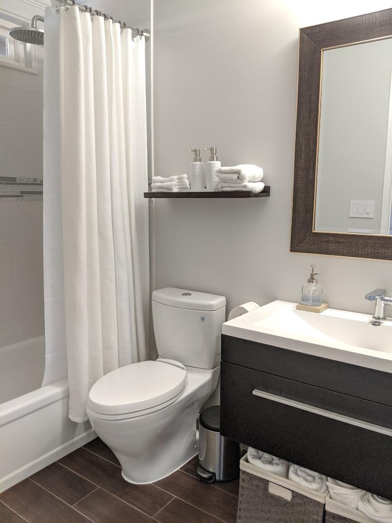 965 Viewpointe Boulevard Rodeo, CA 94572 - Photo 8 of 10 a bathroom with a sink and a toilet