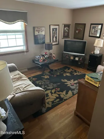 a bedroom with a bed and furniture