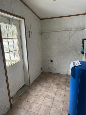 a view of a bathroom with bathtub