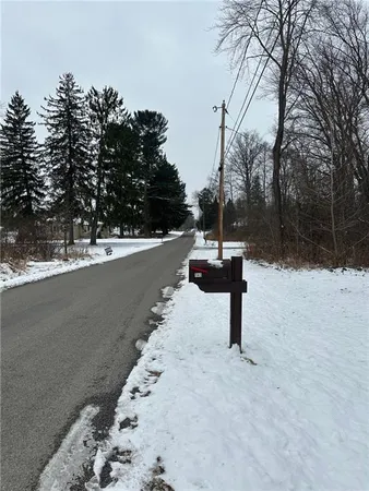 a view of a road with a snow on the road