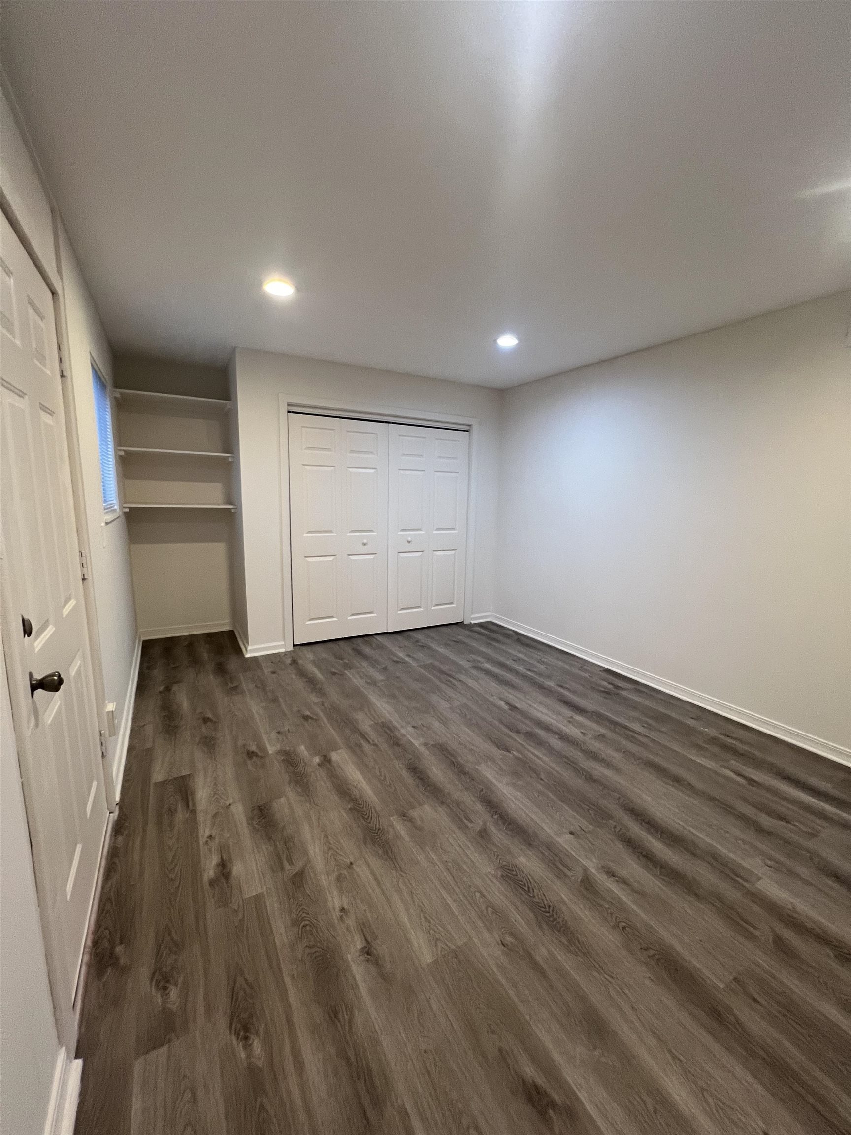 203 6th Street, Unit A St. Augustine, FL 32080 - Photo 12 of 21 wooden floor in an empty room