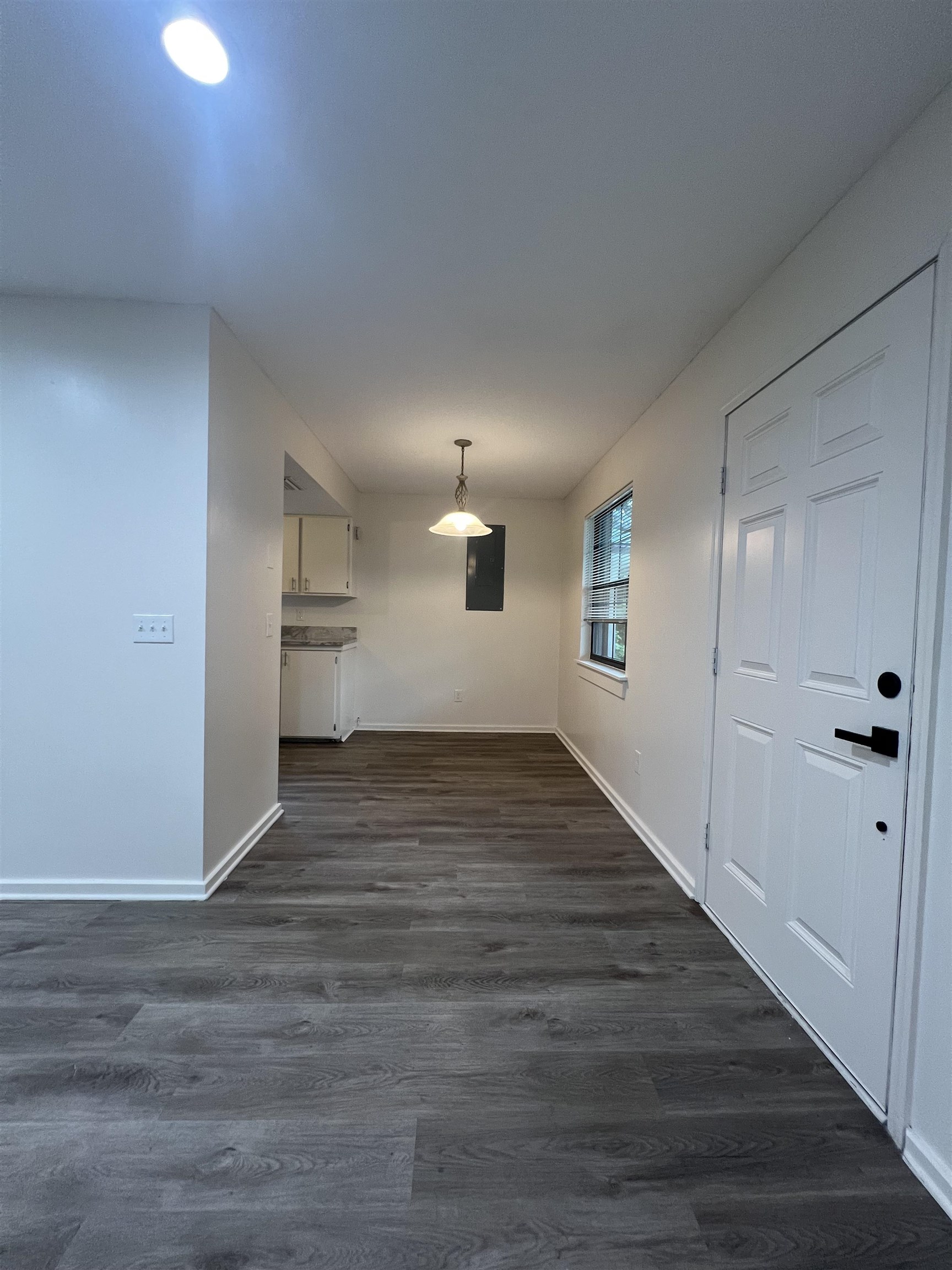 203 6th Street, Unit A St. Augustine, FL 32080 - Photo 14 of 21 a view of empty room with wooden floor