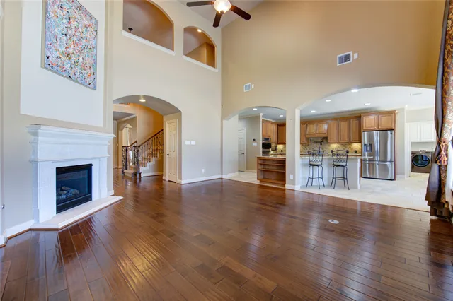 a view of a kitchen with furniture and a fireplace