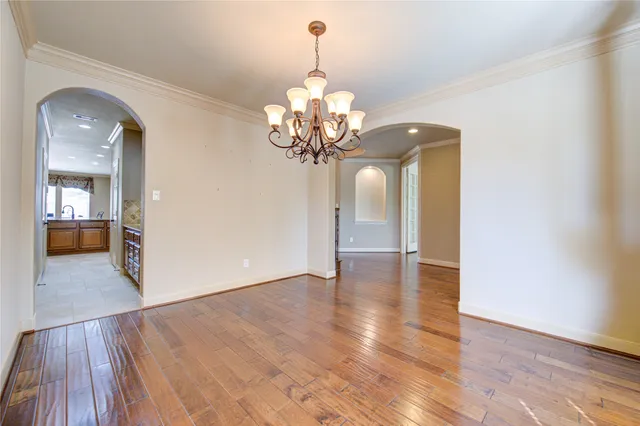 a view of a chandelier in a room with a chandelier