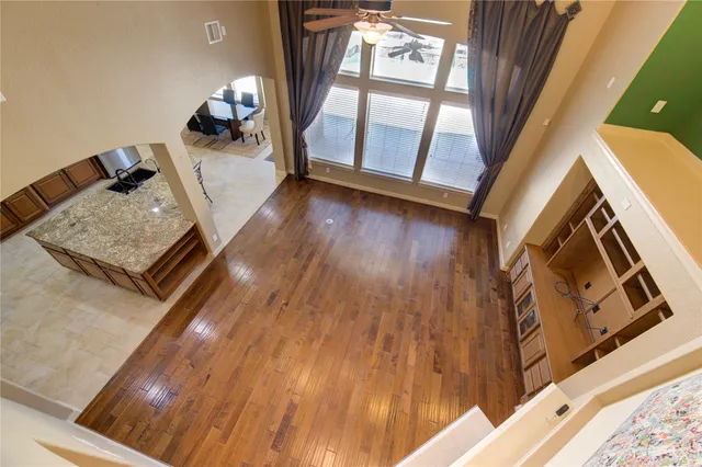 a view of an entryway with wooden floor