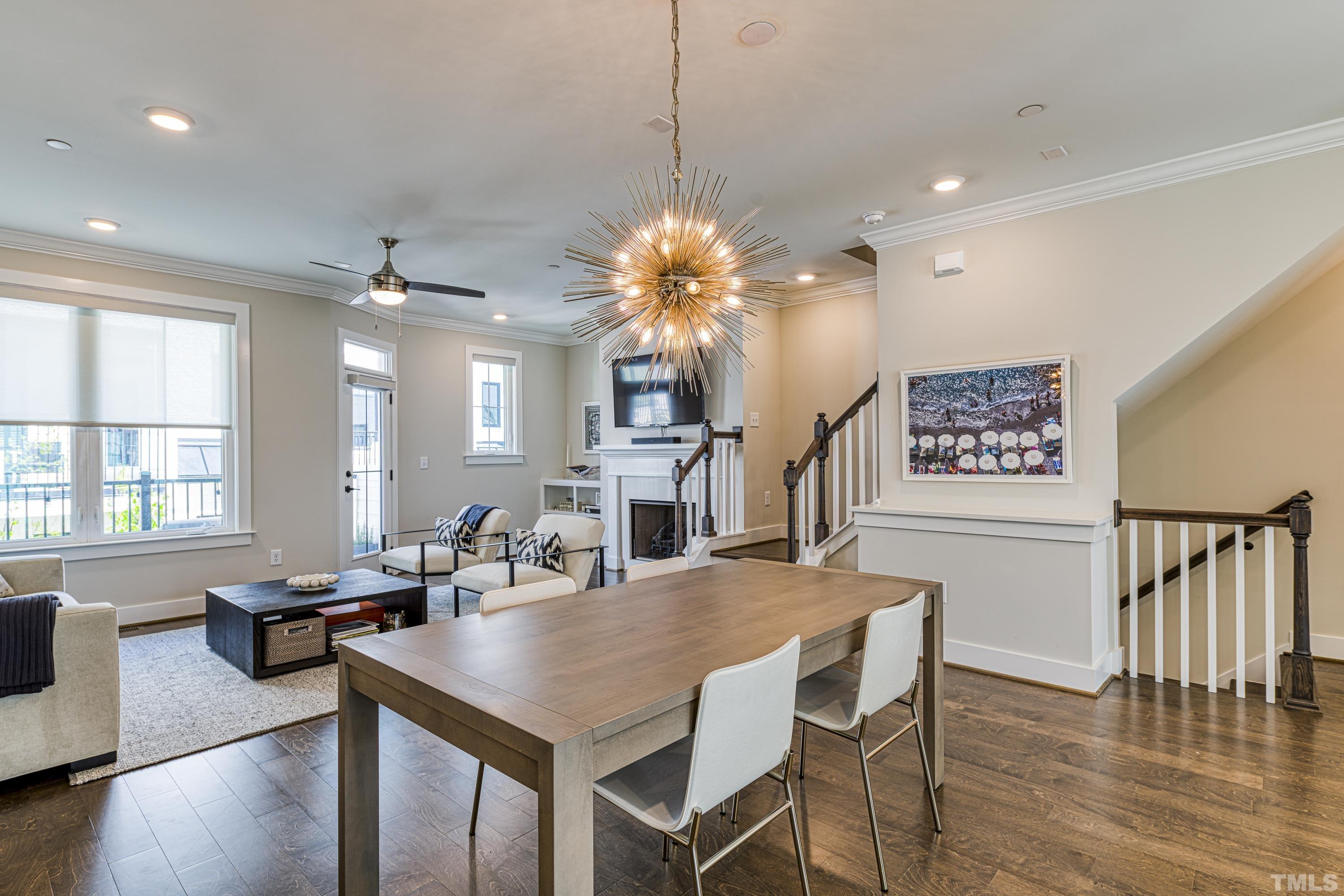 401 Bryan Pointe Drive, Unit 103 Raleigh, NC 27608 - Photo 18 of 33 a view of a dining room with furniture window and wooden floor