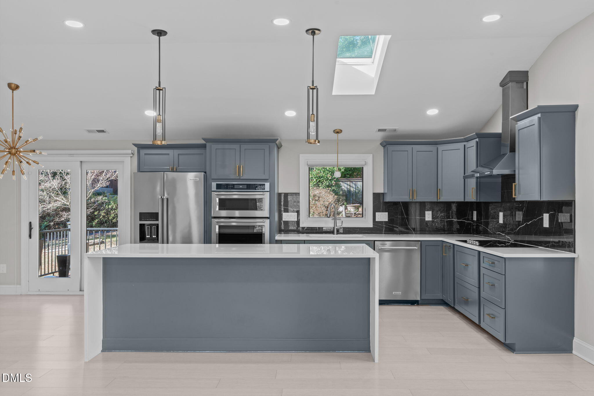 3513 Brook Drive Raleigh, NC 27609 - Photo 15 of 61 a large kitchen with stainless steel appliances lots of counter space cabinets and a counter space