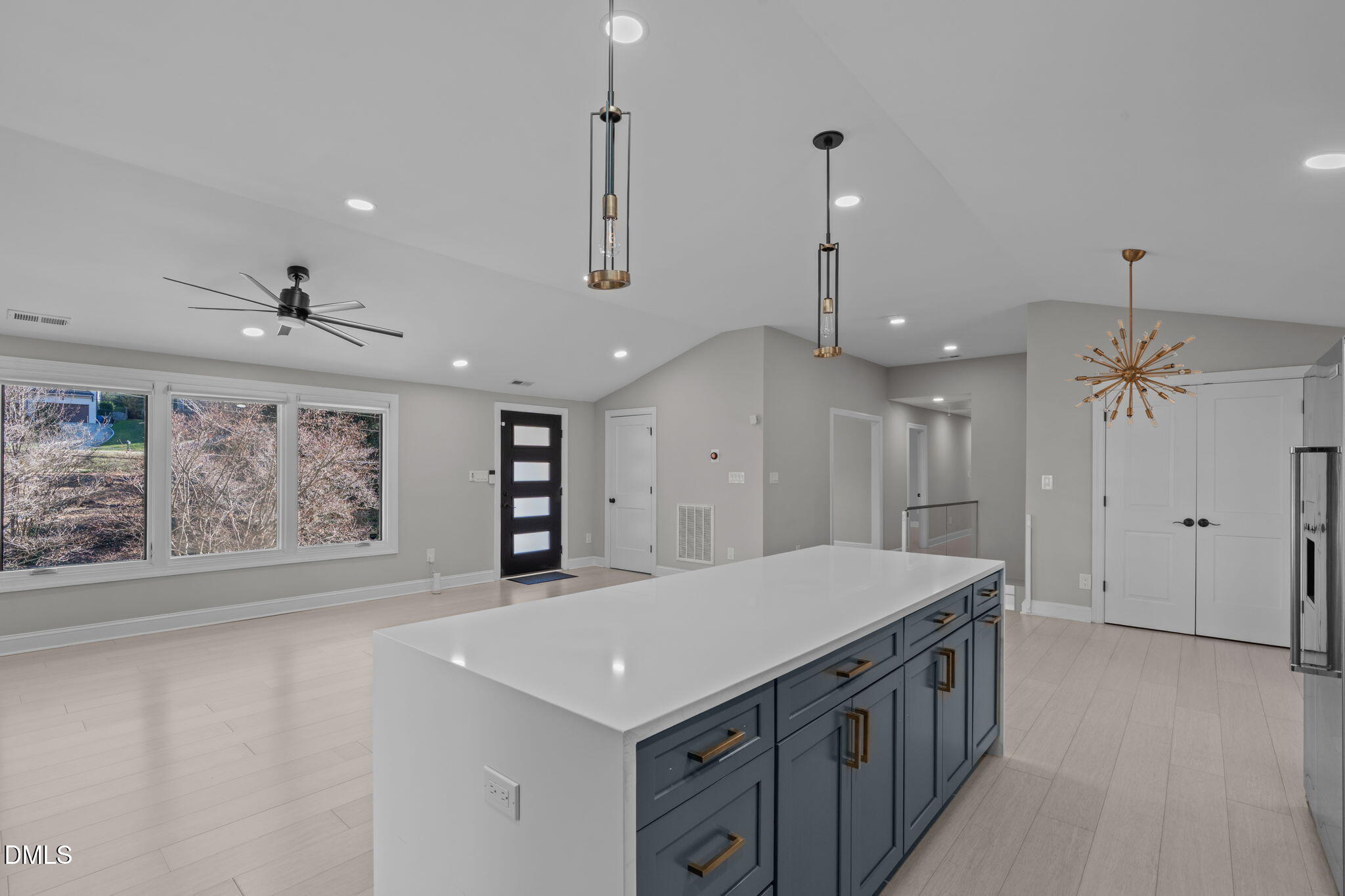 3513 Brook Drive Raleigh, NC 27609 - Photo 17 of 61 a kitchen with a stove a refrigerator a sink and chairs
