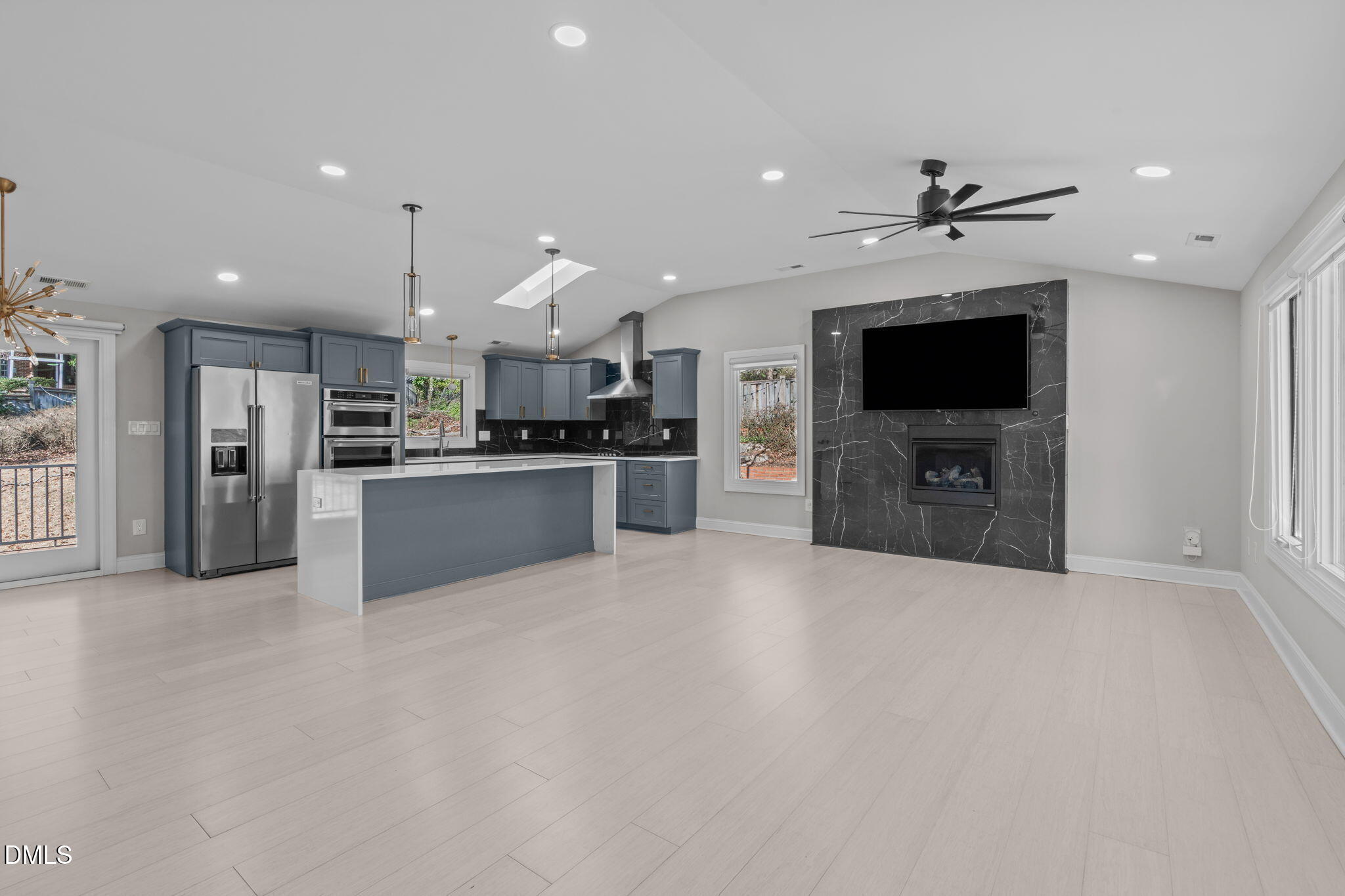3513 Brook Drive Raleigh, NC 27609 - Photo 4 of 61 a view of kitchen with refrigerator stove microwave and cabinets