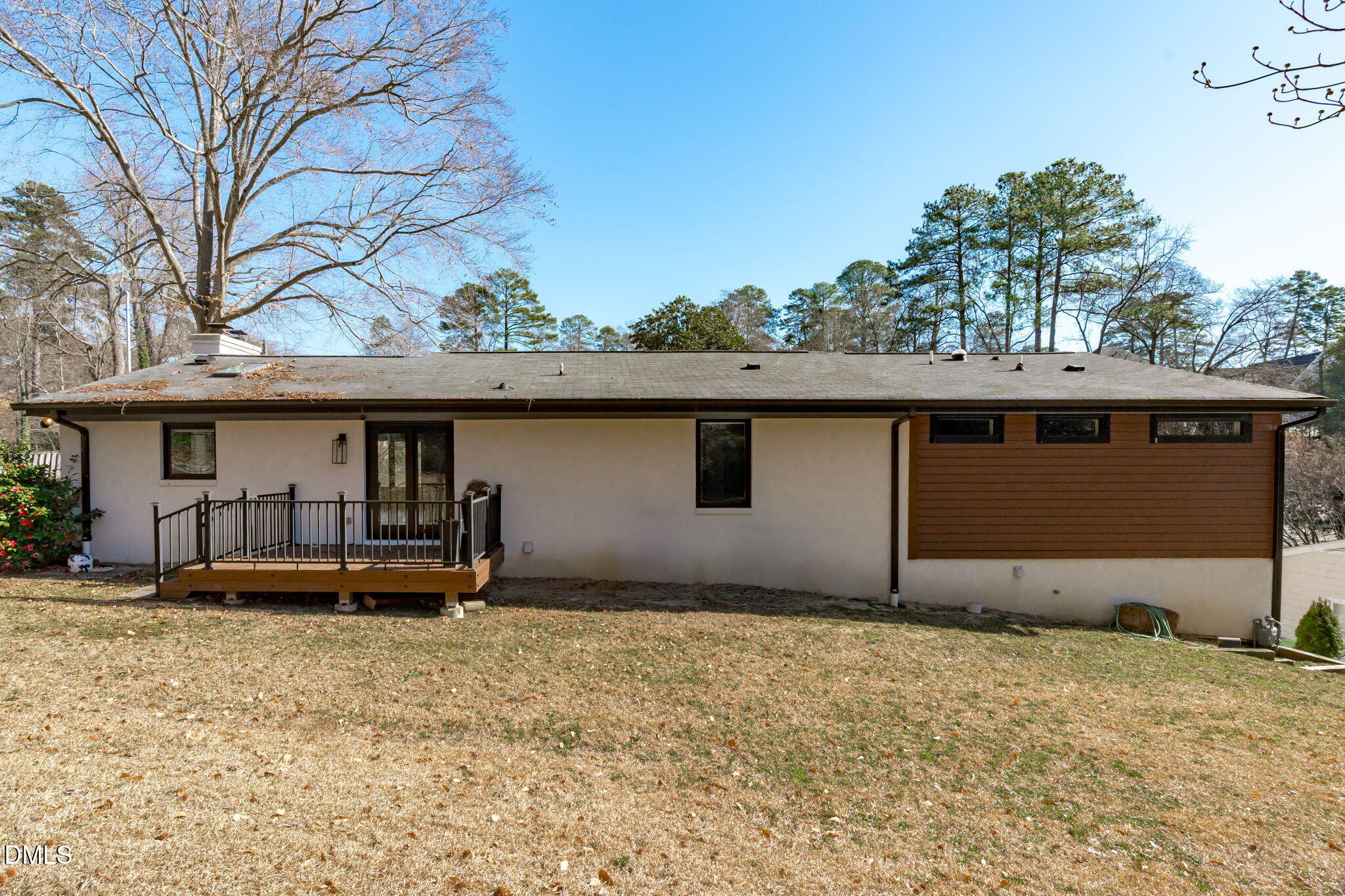 3513 Brook Drive Raleigh, NC 27609 - Photo 52 of 61 a backyard of a house with table and chairs