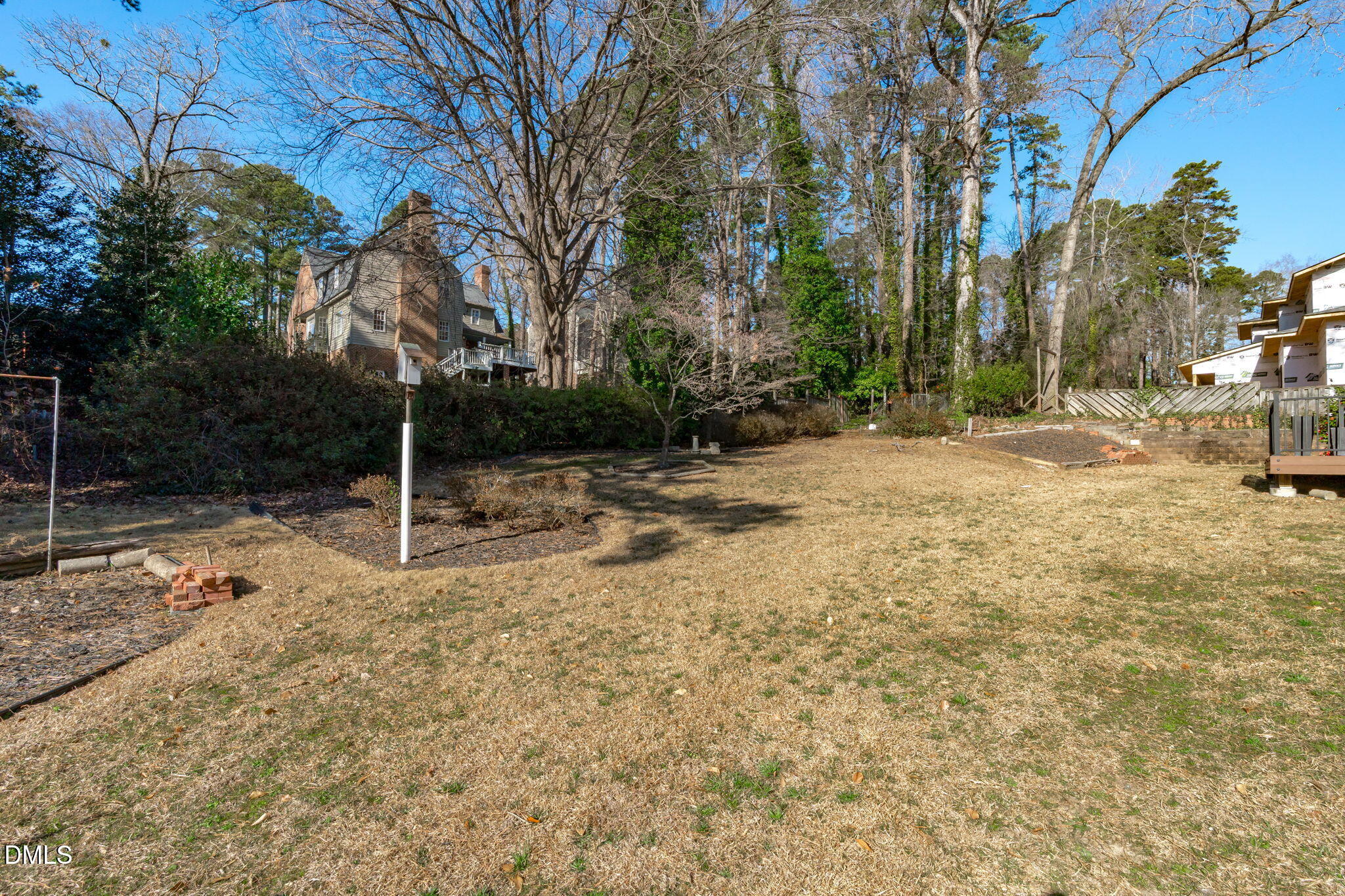 3513 Brook Drive Raleigh, NC 27609 - Photo 54 of 61 a backyard of a house with lots of green space