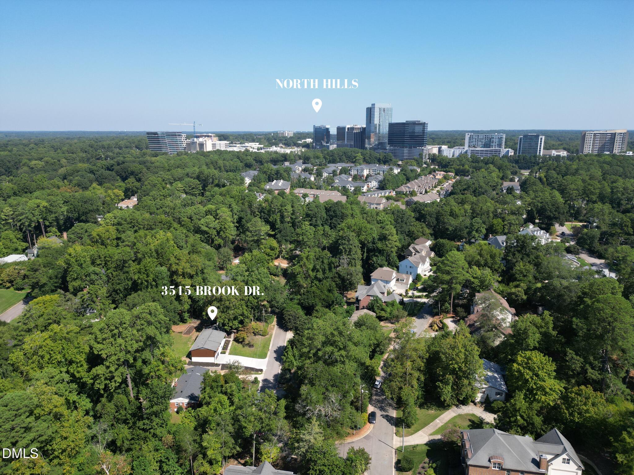 3513 Brook Drive Raleigh, NC 27609 - Photo 55 of 61 an aerial view of a city with lots of residential buildings