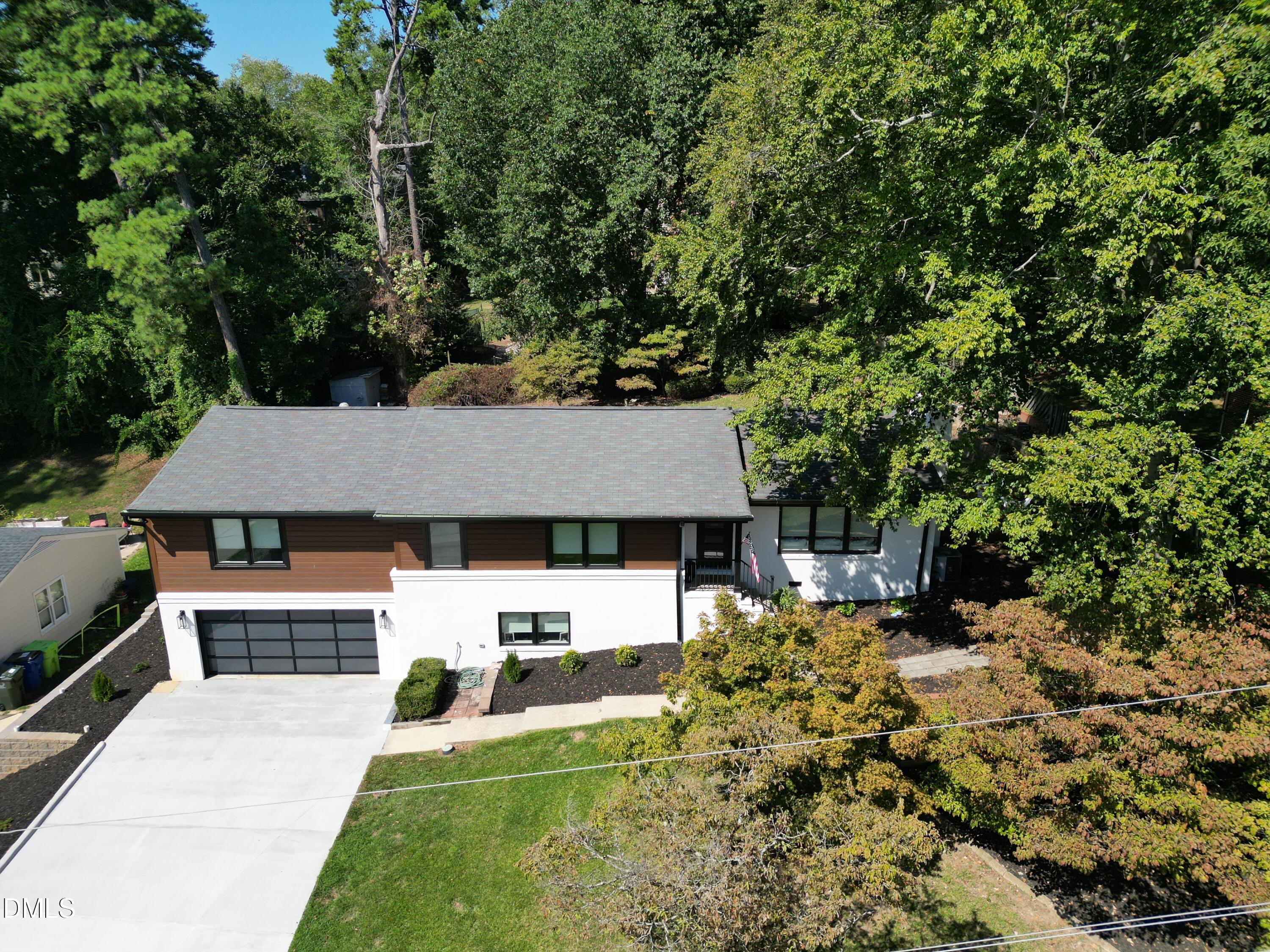 3513 Brook Drive Raleigh, NC 27609 - Photo 58 of 61 a view of a house with a yard
