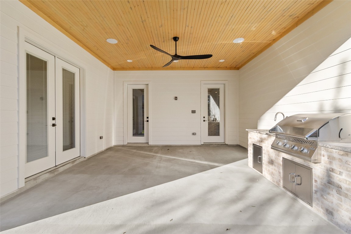 7115 Raton Street Houston, TX 77055 - Photo 33 of 49 Your yard feels open and functional, offering plenty of room for entertaining, gardening, or quiet evenings outside, all while enjoying the privacy created by the fence line and surrounding homes.