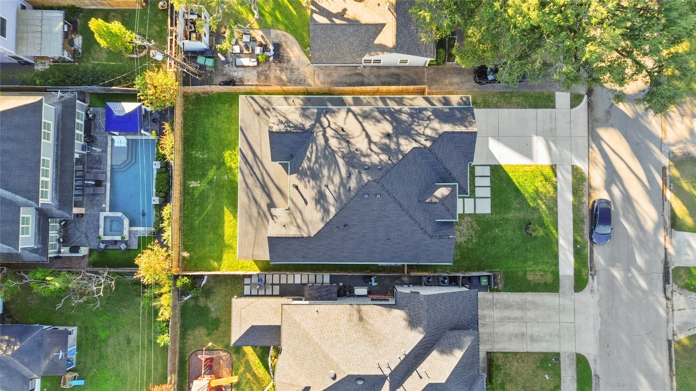 7115 Raton Street Houston, TX 77055 - Photo 48 of 49 From above, you can really appreciate how much space you have to work with—your home sits comfortably on the lot with a generous backyard, clean rooflines, and plenty of separation from neighboring homes, giving you both privacy and breathing room.