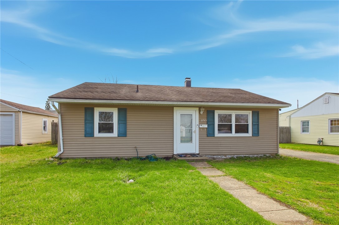 2745 Share Street Springfield, OH 45505 - Photo 3 of 28 This cozy home offers a welcoming facade with a classic porch and durable siding.