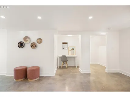 a living room with a couch and a table