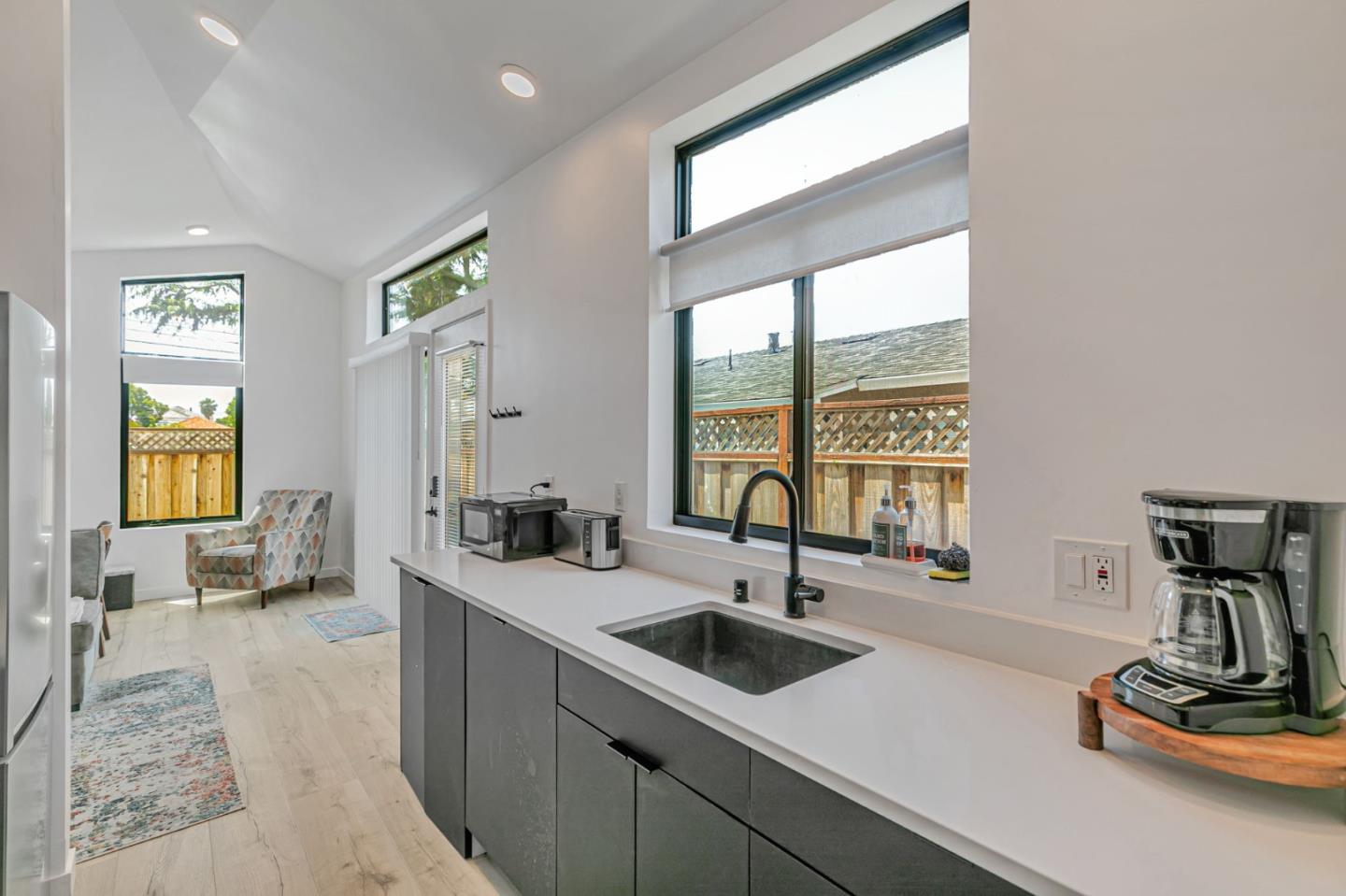 1555 Washington Street Santa Clara, CA 95050 - Photo 10 of 19 a kitchen with a sink and a window