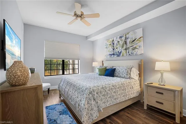 a spacious bathroom with a sink a mirror a vanity and bathtub