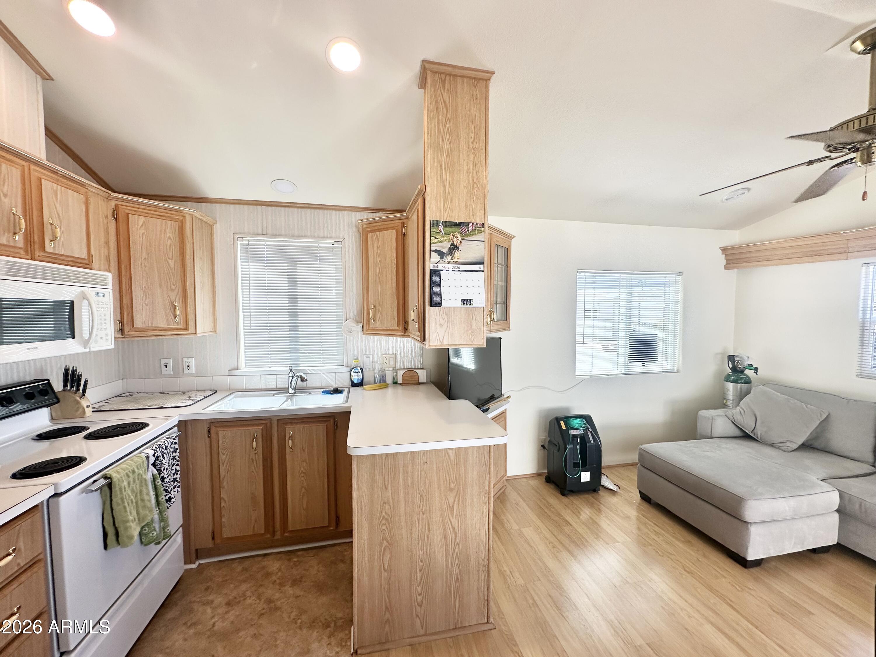 111 South Greenfield Road, Unit 809 Mesa, AZ 85206 - Photo 18 of 49 U-SHAPED KITCHEN