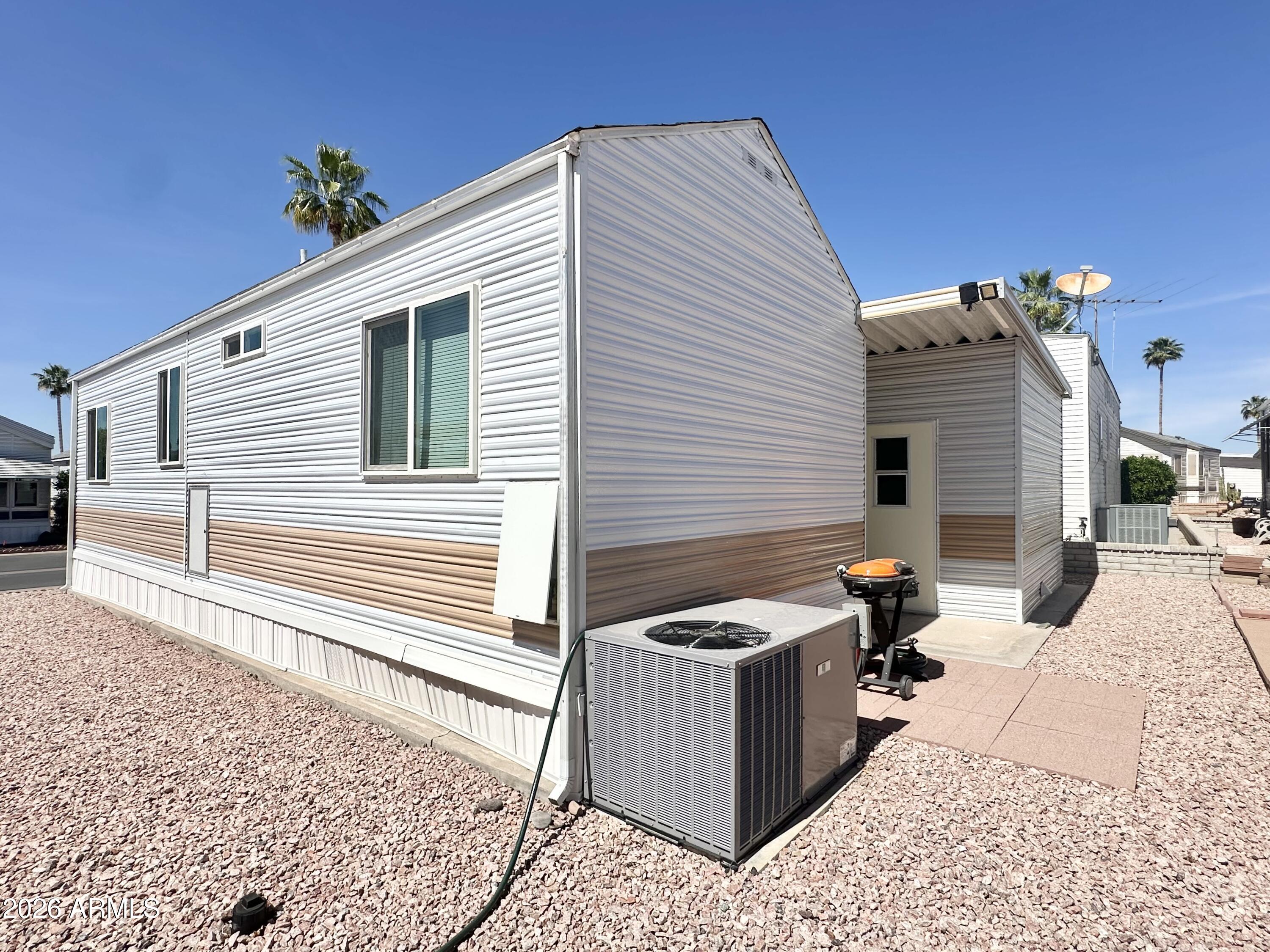 111 South Greenfield Road, Unit 809 Mesa, AZ 85206 - Photo 37 of 49 BACK PATIO/SIDE OF HOME