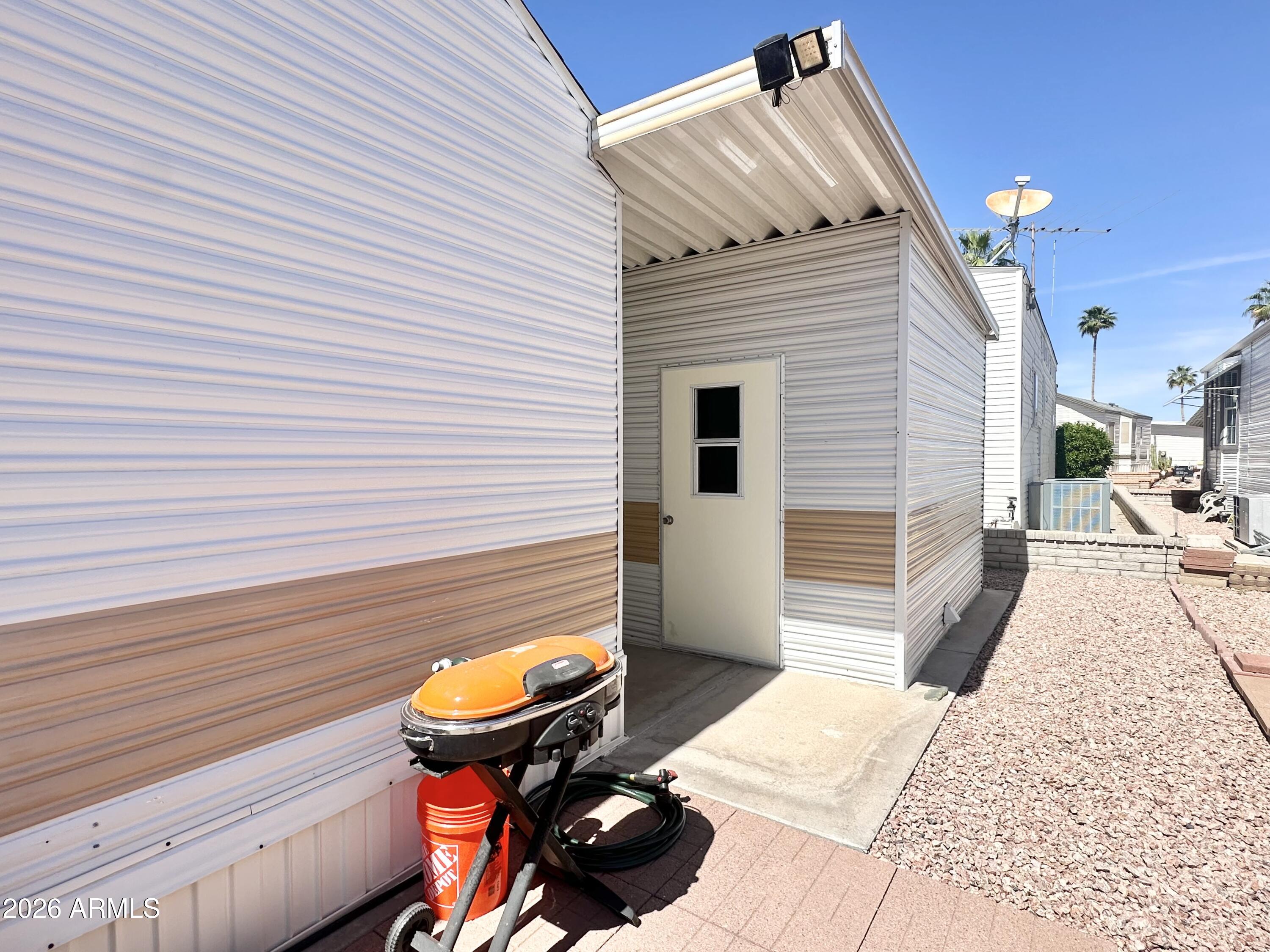 111 South Greenfield Road, Unit 809 Mesa, AZ 85206 - Photo 39 of 49 SHED ENTRY DOOR