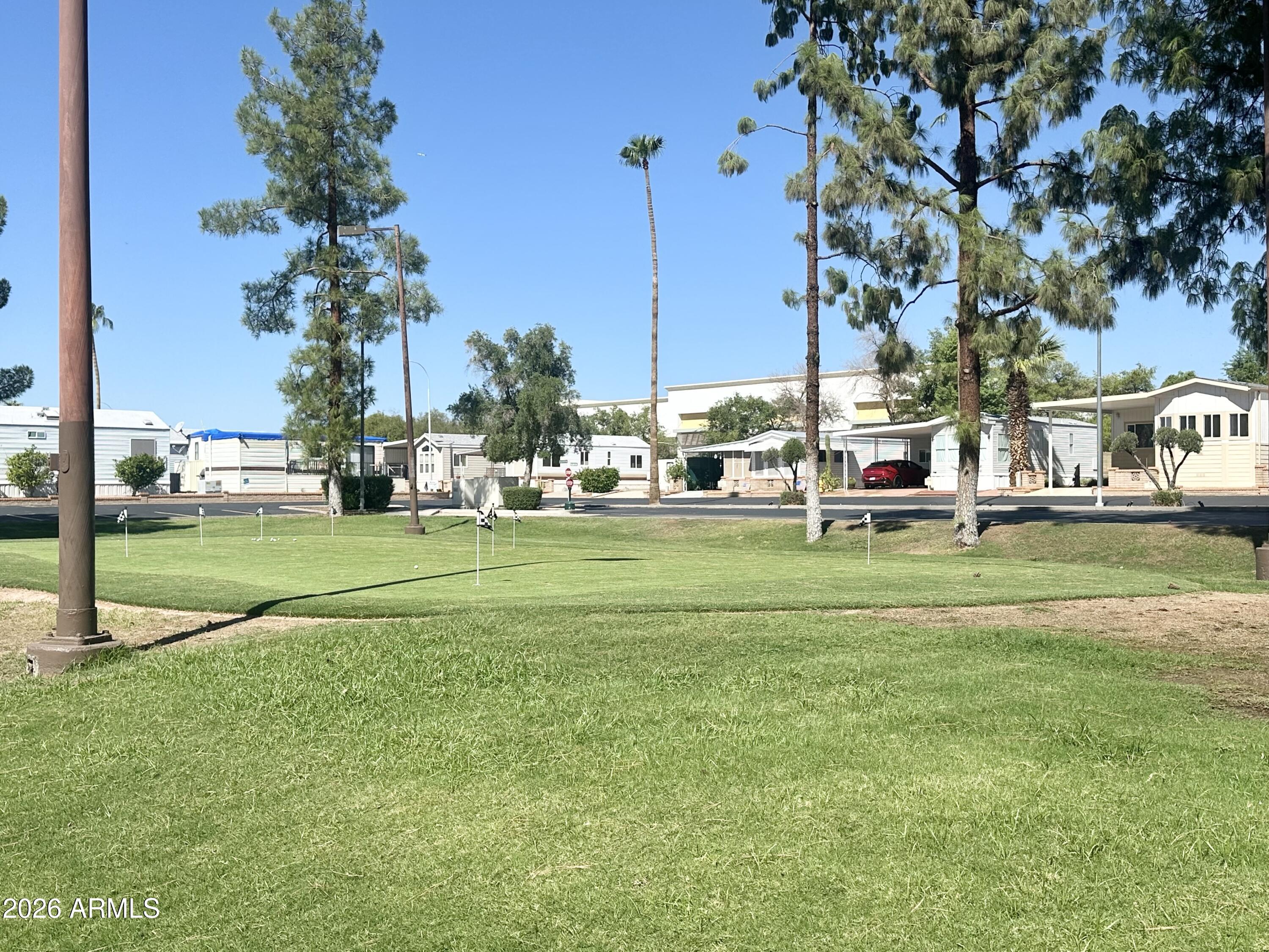 111 South Greenfield Road, Unit 809 Mesa, AZ 85206 - Photo 45 of 49 PUTTING GREEN