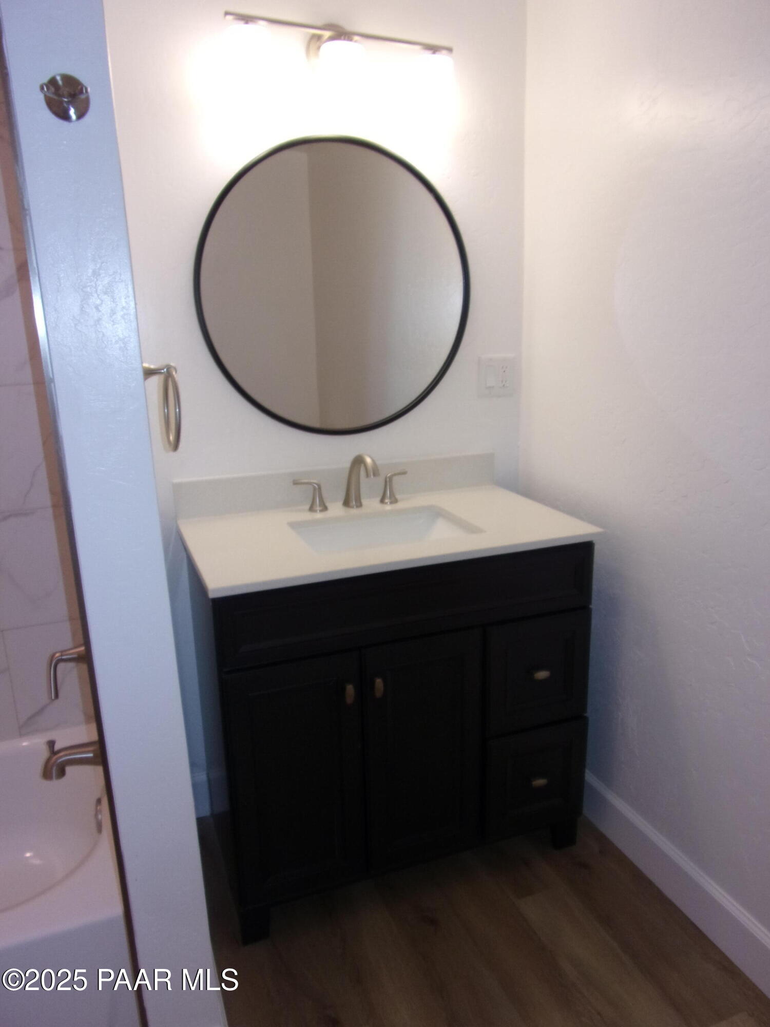 5280 Diamond Drive, Unit A Prescott, AZ 86301 - Photo 7 of 11 a bathroom with a sink and a mirror