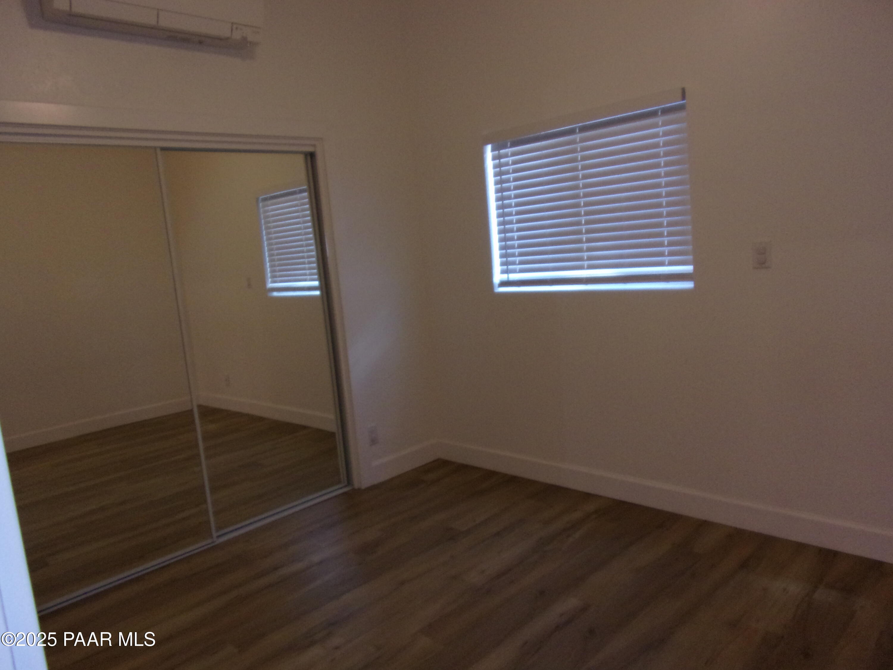 5280 Diamond Drive, Unit A Prescott, AZ 86301 - Photo 9 of 11 a view of storage and utility room with wooden floor